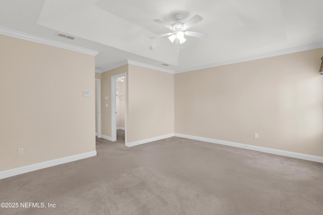11582 Wynnfield Lakes Cir, Jacksonville, FL 32246 - unfurnished room with ceiling fan, carpet flooring, ornamental molding, and a tray ceiling