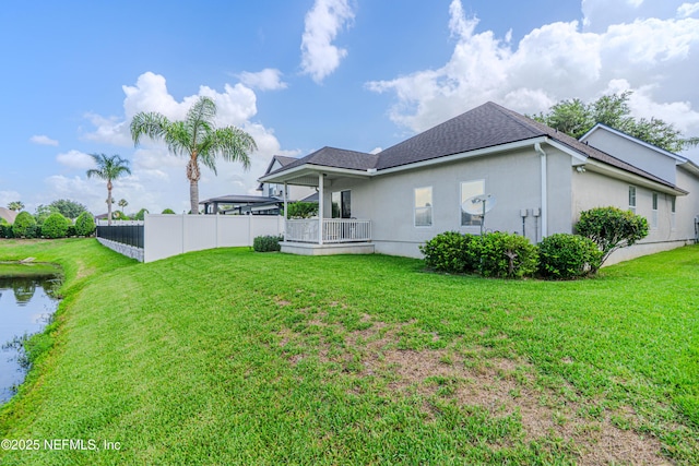 11582 Wynnfield Lakes Cir, Jacksonville, FL 32246 - back of property with stucco siding and a shingled roof