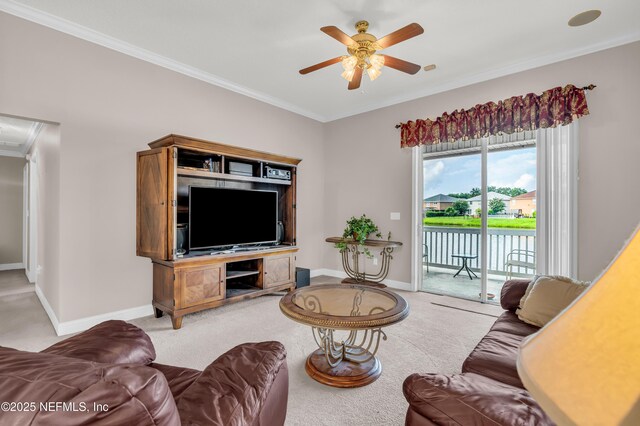 11582 Wynnfield Lakes Cir, Jacksonville, FL 32246 - living area with light colored carpet, ornamental molding, and ceiling fan