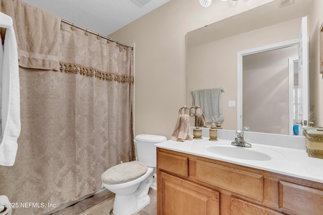 11582 Wynnfield Lakes Cir, Jacksonville, FL 32246 - full bath featuring vanity, tile patterned floors, a textured ceiling, and curtained shower