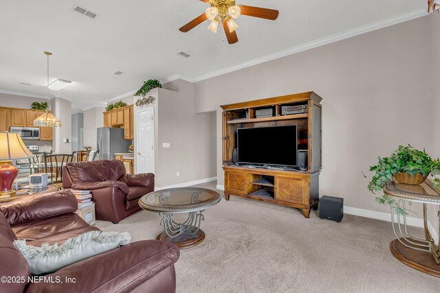 11582 Wynnfield Lakes Cir, Jacksonville, FL 32246 - living area featuring light colored carpet, crown molding, and a ceiling fan