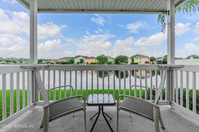 11582 Wynnfield Lakes Cir, Jacksonville, FL 32246 - balcony with a residential view and a water view