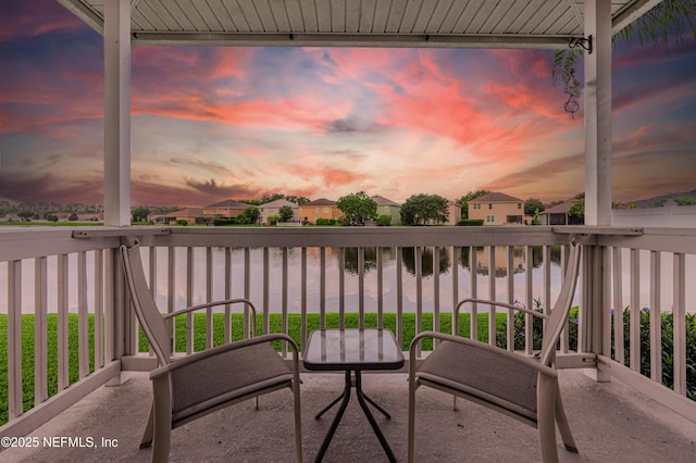11582 Wynnfield Lakes Cir, Jacksonville, FL 32246 - balcony featuring a water view and a residential view