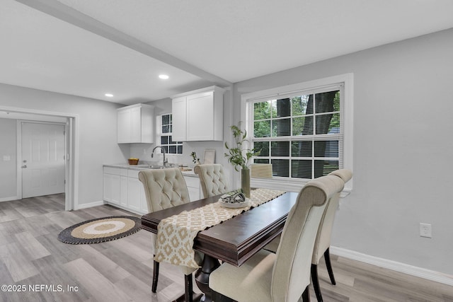 9076 1st Ave, Jacksonville, FL 32208 - dining room featuring recessed lighting and light wood-style flooring