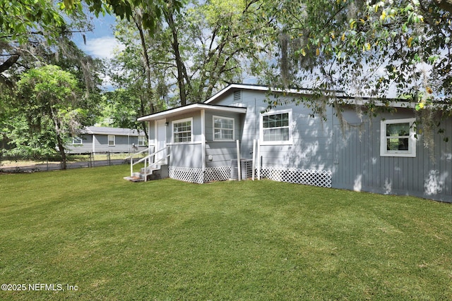 9076 1st Ave, Jacksonville, FL 32208 - rear view of property with entry steps