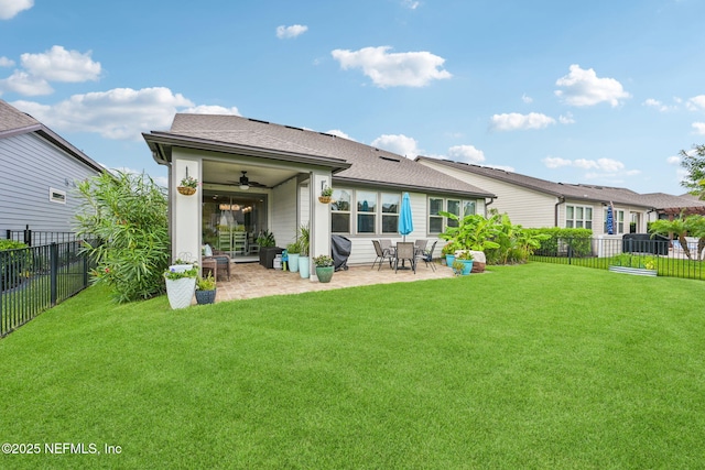 600 Broomsedge Cir, Saint Augustine, FL 32095 - rear view of house featuring a patio, a fenced backyard, a ceiling fan, and roof with shingles
