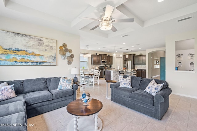 600 Broomsedge Cir, Saint Augustine, FL 32095 - living room featuring coffered ceiling, ceiling fan, recessed lighting, beamed ceiling, and arched walkways