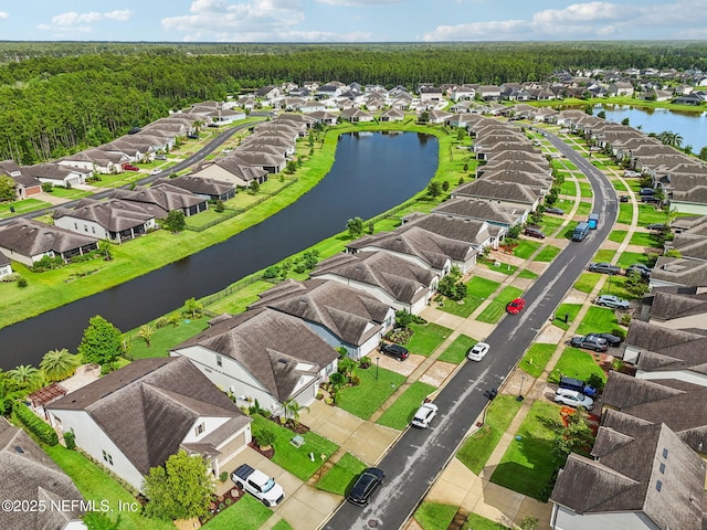 600 Broomsedge Cir, Saint Augustine, FL 32095 - aerial view of residential area featuring a large body of water and a forest