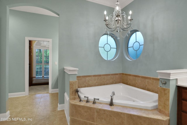528 Sebastian Sq, Saint Augustine, FL 32095 - bathroom with vanity, a bath, tile patterned flooring, and a chandelier