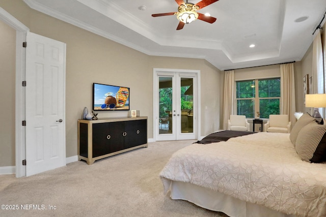 528 Sebastian Sq, Saint Augustine, FL 32095 - bedroom featuring a raised ceiling, french doors, access to outside, carpet flooring, and ornamental molding