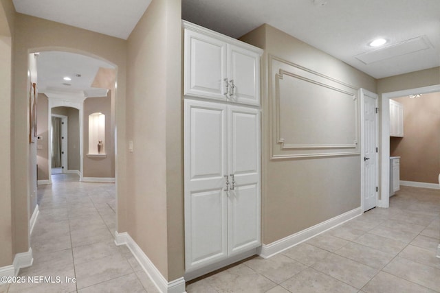 528 Sebastian Sq, Saint Augustine, FL 32095 - hall featuring arched walkways and light tile patterned flooring