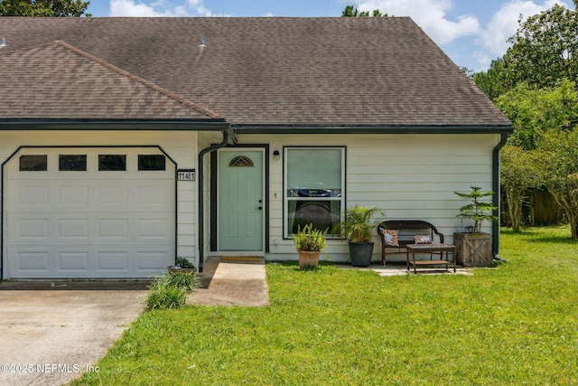 11461 Willet Ct S, Jacksonville, FL 32225 - view of front of home featuring roof with shingles, a garage, a front yard, and concrete driveway