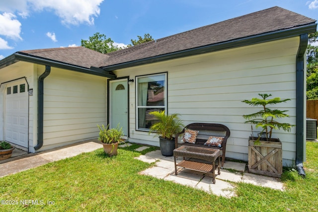 11461 Willet Ct S, Jacksonville, FL 32225 - view of front of home with roof with shingles, a front lawn, and an attached garage