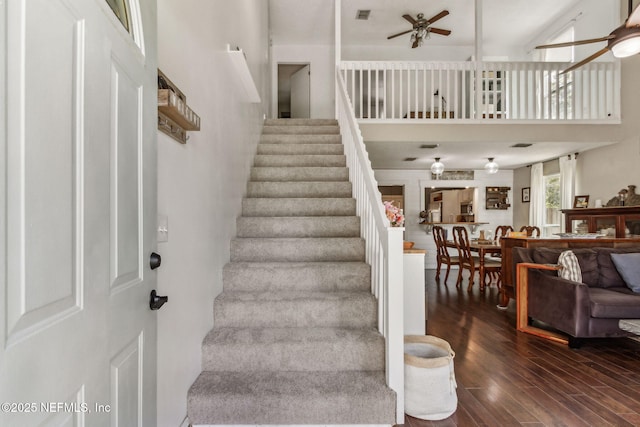 11461 Willet Ct S, Jacksonville, FL 32225 - stairs with ceiling fan, wood finished floors, and a high ceiling