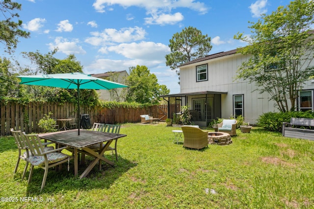 11461 Willet Ct S, Jacksonville, FL 32225 - view of yard with an outdoor fire pit and a sunroom