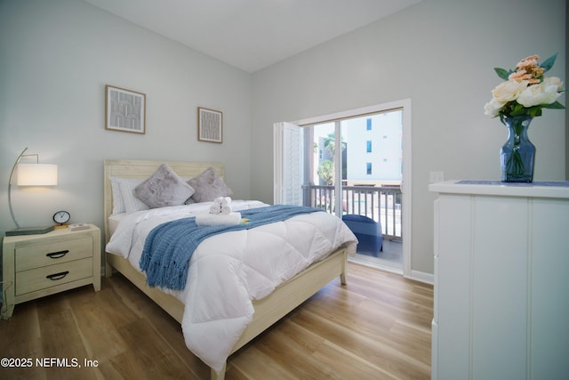 126 1st St S, Jacksonville Beach, FL 32250 - bedroom featuring access to outside and wood finished floors