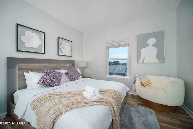 126 1st St S, Jacksonville Beach, FL 32250 - bedroom with baseboards and wood finished floors
