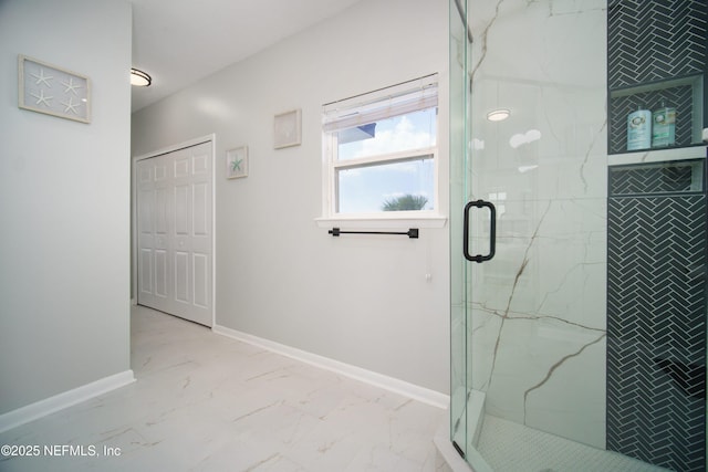 126 1st St S, Jacksonville Beach, FL 32250 - bathroom with marble finish floors, a marble finish shower, and baseboards