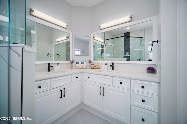 126 1st St S, Jacksonville Beach, FL 32250 - full bath featuring a marble finish shower, double vanity, and marble finish floors