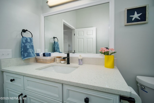 126 1st St S, Jacksonville Beach, FL 32250 - bathroom with vanity and toilet
