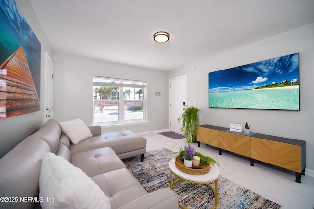 126 1st St S, Jacksonville Beach, FL 32250 - living area featuring baseboards
