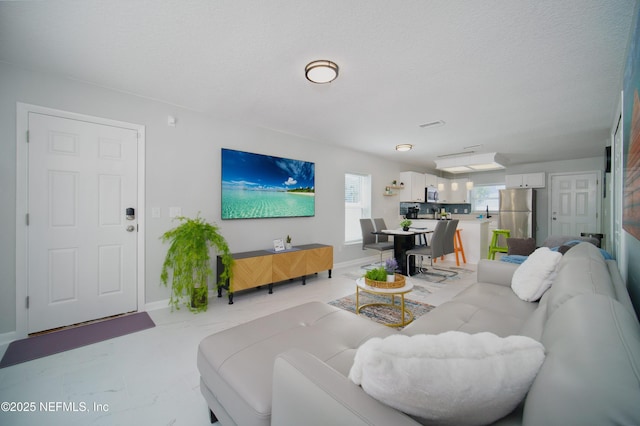 126 1st St S, Jacksonville Beach, FL 32250 - living room with baseboards