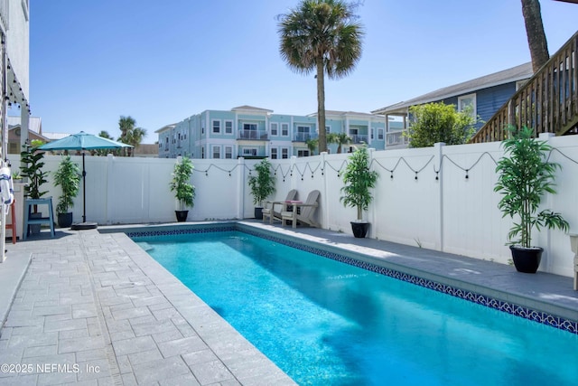 126 1st St S, Jacksonville Beach, FL 32250 - view of pool featuring a fenced backyard, a residential view, and a patio area