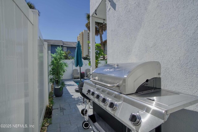 126 1st St S, Jacksonville Beach, FL 32250 - view of patio / terrace with area for grilling