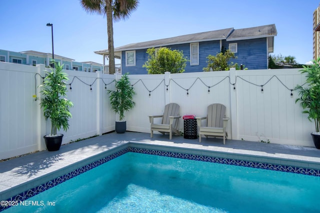 126 1st St S, Jacksonville Beach, FL 32250 - view of swimming pool featuring a fenced backyard