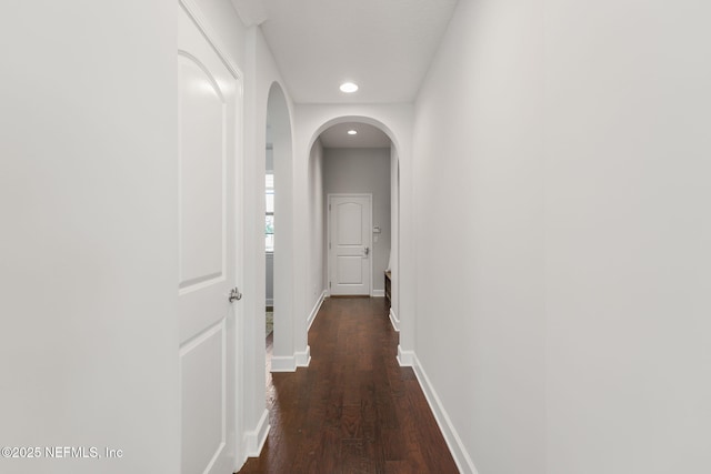 186 Citrus Ridge Dr, Ponte Vedra, FL 32081 - hallway featuring arched walkways, recessed lighting, and wood finished floors