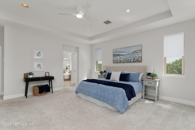 186 Citrus Ridge Dr, Ponte Vedra, FL 32081 - bedroom featuring light carpet, a tray ceiling, recessed lighting, ensuite bathroom, and ceiling fan