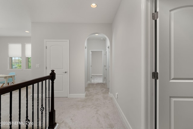 186 Citrus Ridge Dr, Ponte Vedra, FL 32081 - hall featuring arched walkways, carpet floors, recessed lighting, and an upstairs landing