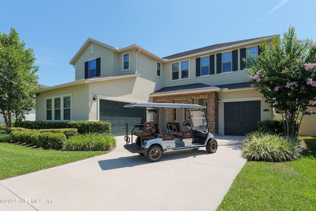 186 Citrus Ridge Dr, Ponte Vedra, FL 32081 - view of front of property featuring driveway, a garage, and stucco siding