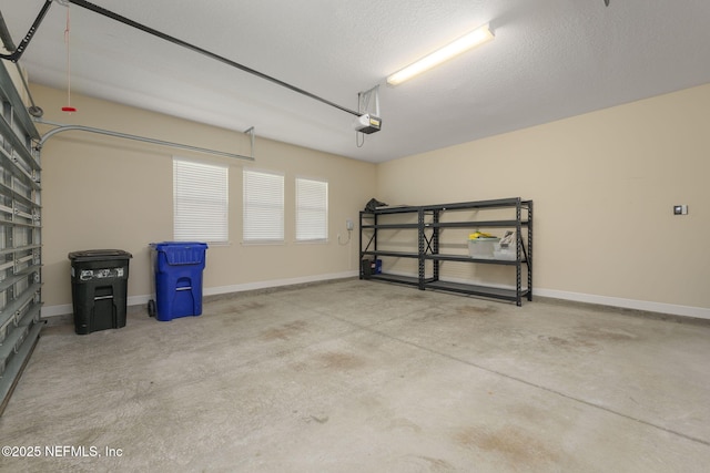 186 Citrus Ridge Dr, Ponte Vedra, FL 32081 - garage featuring a garage door opener and baseboards
