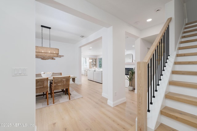 448 Willow Winds Pkwy, Saint Johns, FL 32259 - entryway with stairway, wood finished floors, a chandelier, and recessed lighting