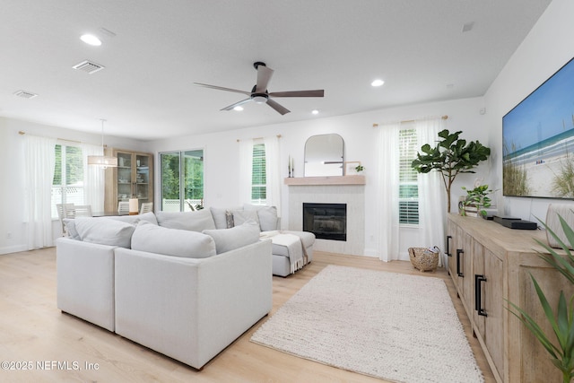 448 Willow Winds Pkwy, Saint Johns, FL 32259 - living area with healthy amount of natural light, light wood finished floors, ceiling fan, a fireplace, and recessed lighting