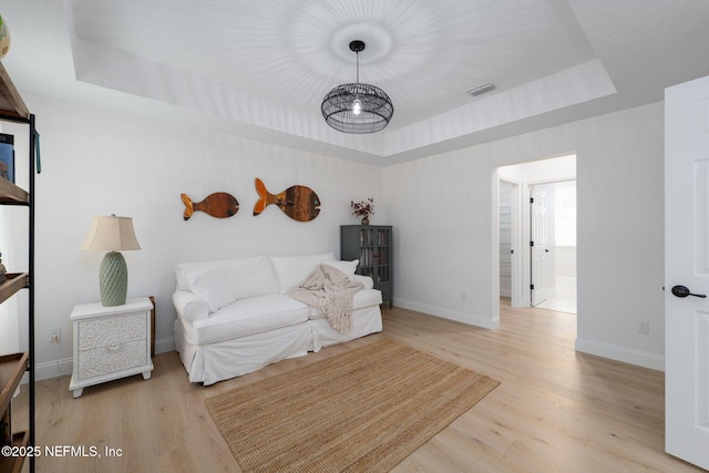 448 Willow Winds Pkwy, Saint Johns, FL 32259 - living area with a tray ceiling and light wood finished floors