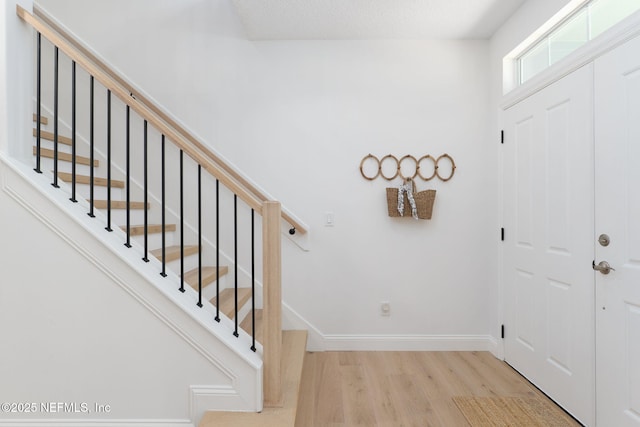 448 Willow Winds Pkwy, Saint Johns, FL 32259 - entrance foyer featuring wood finished floors and stairway