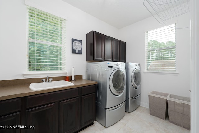 448 Willow Winds Pkwy, Saint Johns, FL 32259 - laundry area with washer and dryer, cabinet space, and light tile patterned floors