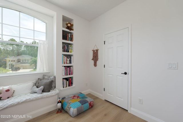 448 Willow Winds Pkwy, Saint Johns, FL 32259 - sitting room with light wood-type flooring and built in shelves