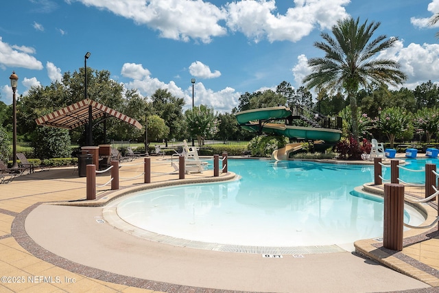 448 Willow Winds Pkwy, Saint Johns, FL 32259 - community pool with a water slide and a patio