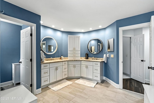 12921 Jupiter Hills Cir N, Jacksonville, FL 32225 - full bathroom with double vanity and recessed lighting