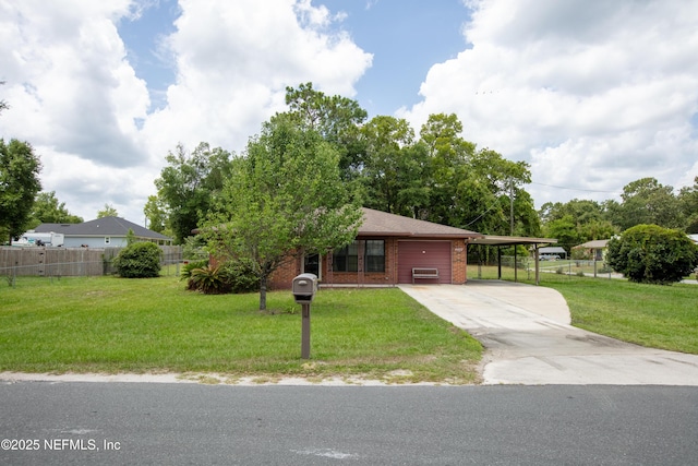 4422 SE 2nd Ave, Keystone Heights, FL 32656 - view of front of home featuring concrete driveway, an attached garage, and brick siding