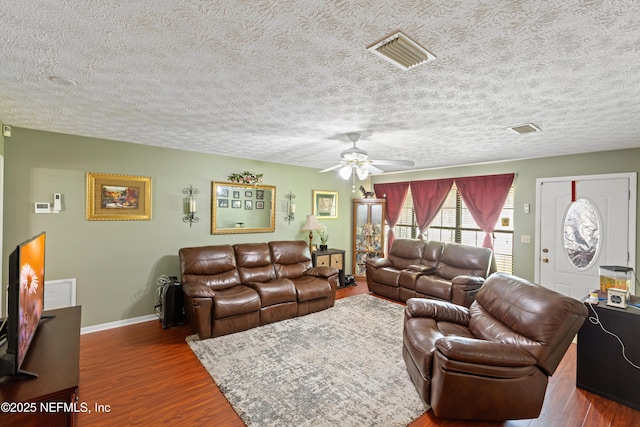 4422 SE 2nd Ave, Keystone Heights, FL 32656 - living area featuring ceiling fan, wood finished floors, and a textured ceiling