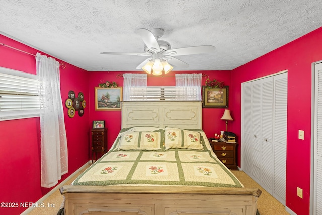 4422 SE 2nd Ave, Keystone Heights, FL 32656 - carpeted bedroom with a textured ceiling and a ceiling fan