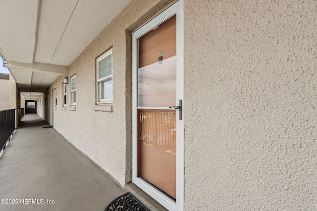 3350 Fletcher Ave Unit 6J, Fernandina Beach, FL 32034 - property entrance featuring stucco siding