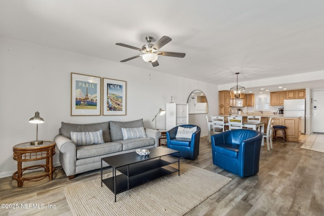 3350 Fletcher Ave Unit 6J, Fernandina Beach, FL 32034 - living room with light wood finished floors and a ceiling fan