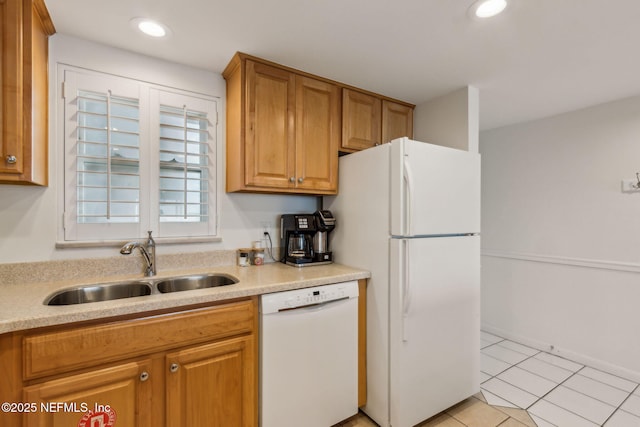3350 Fletcher Ave Unit 6J, Fernandina Beach, FL 32034 - kitchen with white appliances, light countertops, light tile patterned flooring, recessed lighting, and brown cabinetry