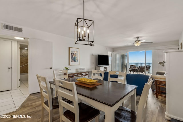 3350 Fletcher Ave Unit 6J, Fernandina Beach, FL 32034 - dining area featuring wood finished floors and a ceiling fan