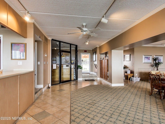 3350 Fletcher Ave Unit 6J, Fernandina Beach, FL 32034 - building lobby featuring ornamental molding and a textured ceiling